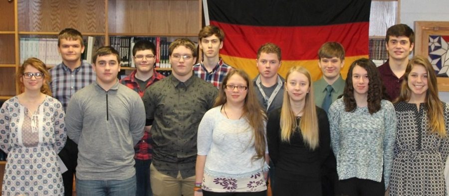 Thirteen Clearfield High School students were recently inducted into Delta Epsilon Phi, the National Honor Society for German Students.  Membership requirements include an “A” in German after at least three semesters, a “B” average over-all, and a clean record of conduct throughout high school.  Pictured below are (left to right)  Kate Barnes, Austin McDanel, Ian Heitsenrether, Nick Blake, Alex Owens, Matt Cowder,     Zoe Poole, Charles Gardner, Alexis   Graham, Logan Sloppy, Emily Shipley, Cade Walker, and Avry Grumblatt.   Mrs. Barbara Simpson is the German teacher who organized the ceremony.  