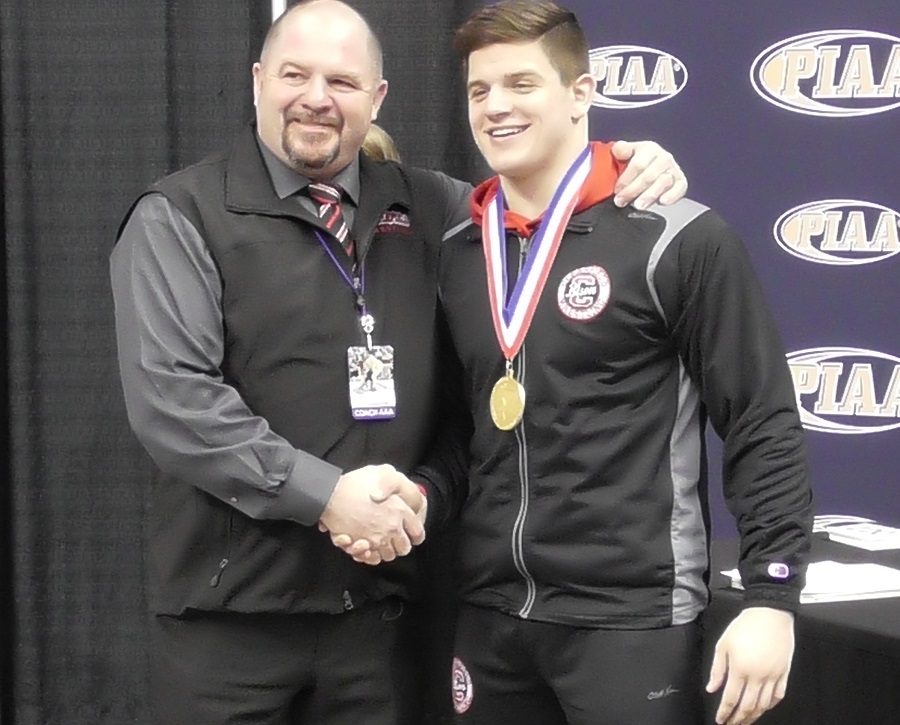 Coach+Aveni+congratulates+Luke+McGonigal+after+his+championship+match+at+states+in+Hershey.+%28Source%3A+D9sports.com%29