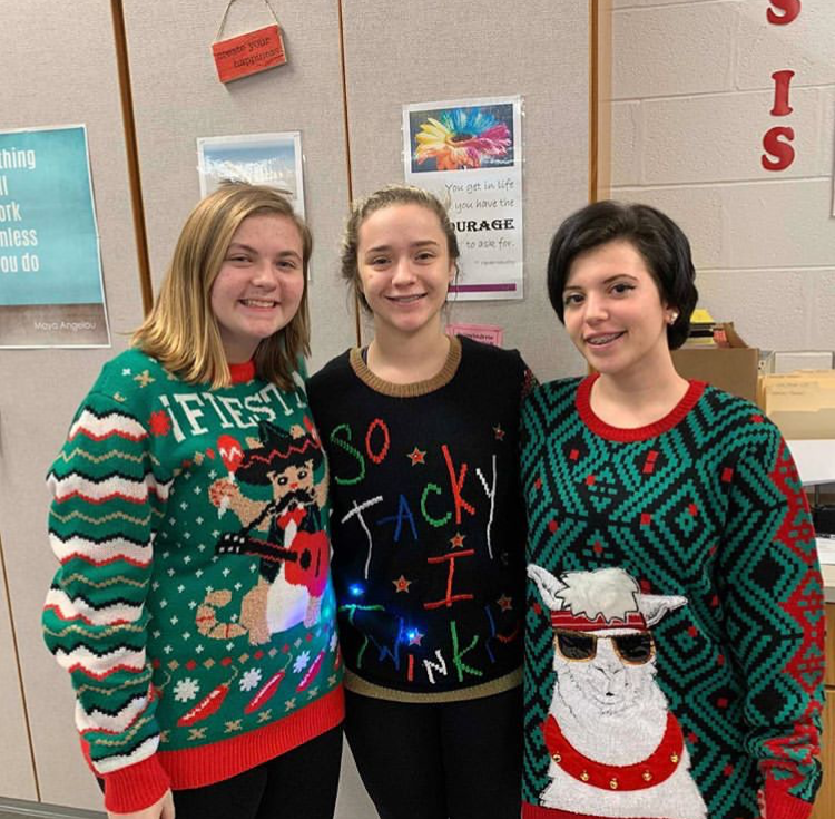 From left: Kendyhl Luzier, Rachel Owens, and Alexia Mick dressing up for Festive Friday