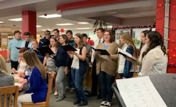 The Caroling Choir performs at the faculty luncheon.