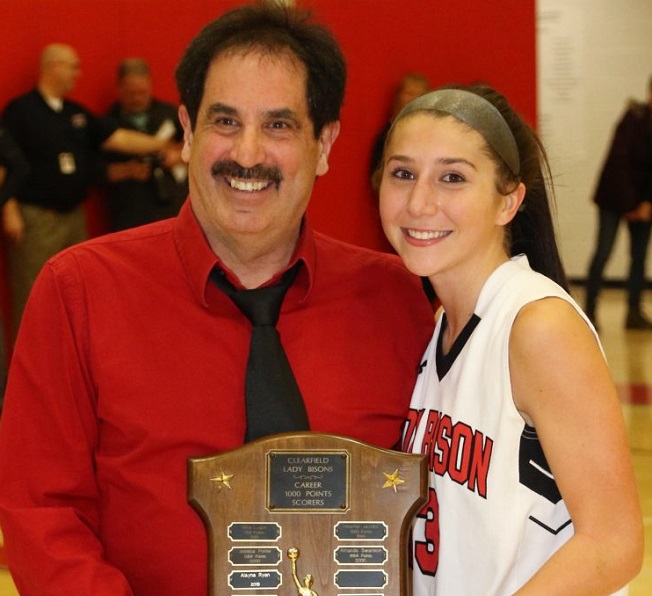%28D9Sports%29+%E2%80%93+Alayna+Ryan+became+the+first+1%2C000-point+scorer+at+Clearfield+in+19+years+and+just+the+fifth+all-time+when+she+reached+the+mark+by+scoring+28+points+in+a+54-52+Mountain+League+loss+to+visiting+Huntingdon.+She+is+shown+with+Coach+Castagnolo.