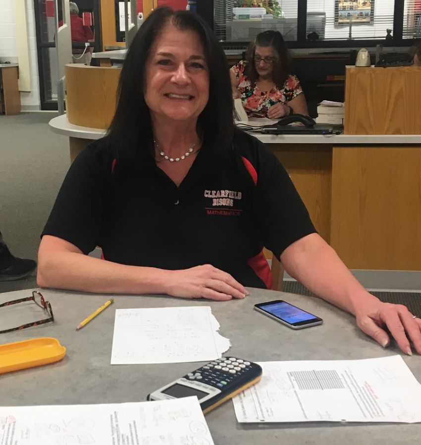 Mrs. Bookhamer during a math tutoring session in the library.