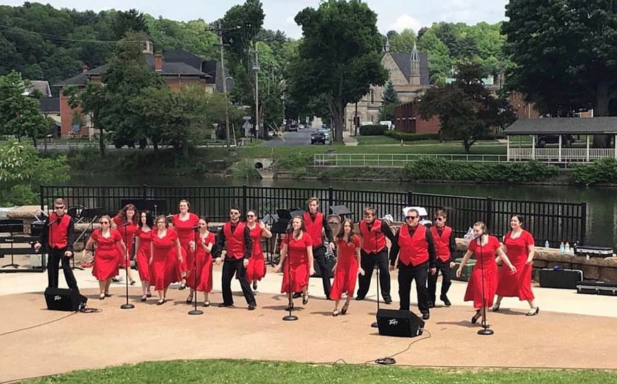 The CHS show choir from last year performs at the Riverwalk.