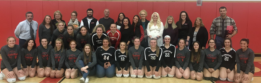 Volleyball players with the teachers of their choice.