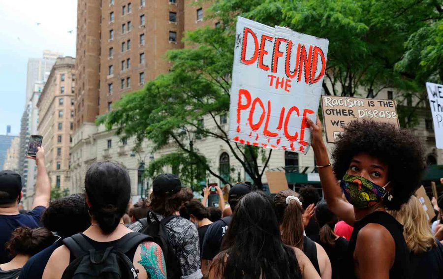 Protester in New York cries out Defund the Police at a George Floyd protest. Source: abcnews.go.com.