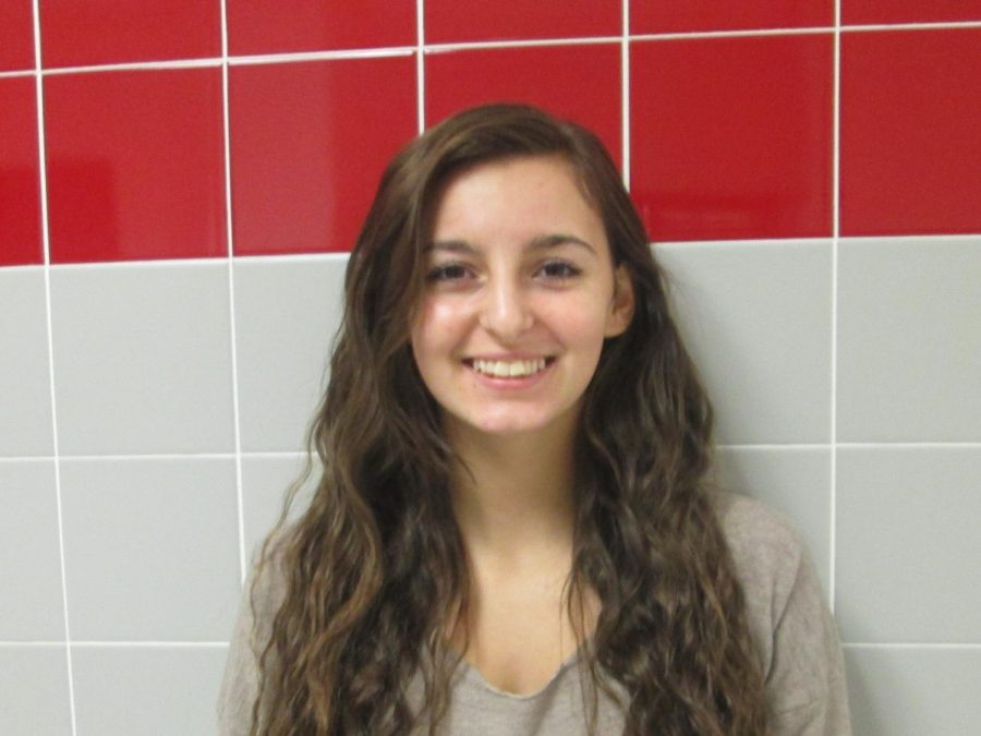 Sabrina Shomo, Grade 11: Spending time with my family by eating Christmas dinner and opening presents together.
