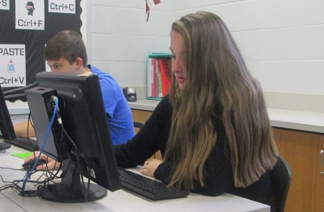 Dylan Thompson and Mindy Flemming participate in the cyber German course at Clearfield.