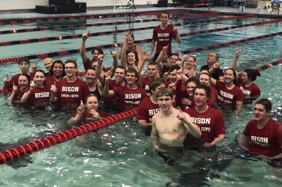 Clearfield+swimmers+celebrate+their+District+IX+championship.+