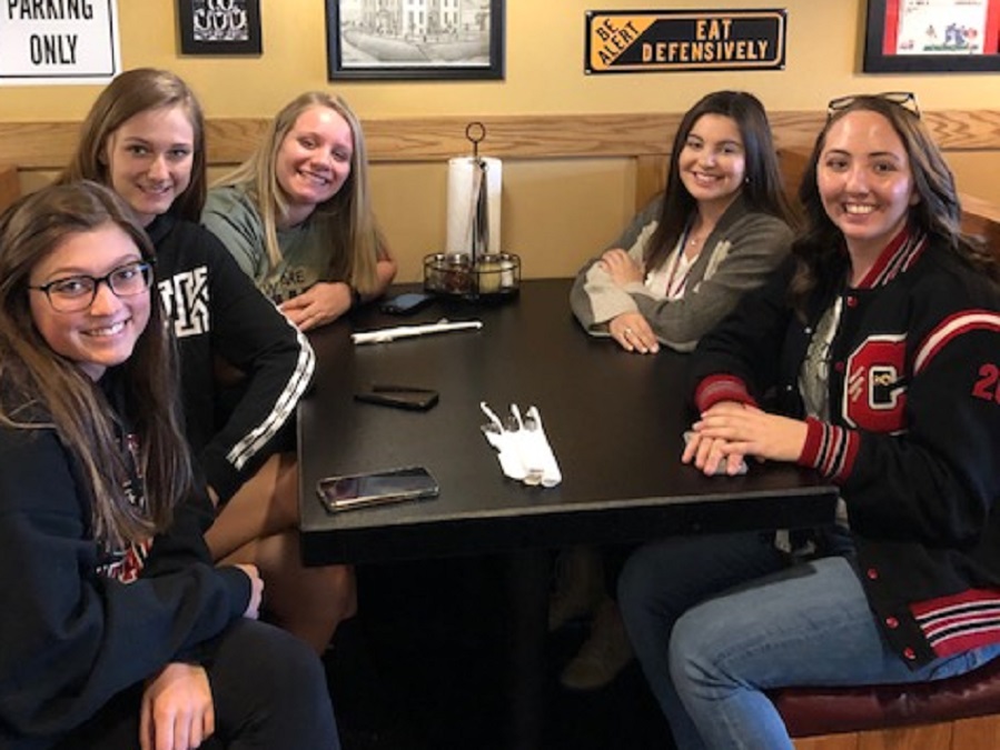 Bella Spingola, Karly Rumsky, Brianna Shaw, Ally Hertlein, and Madilyn Domico waiting for lunch at Pizza Hut.