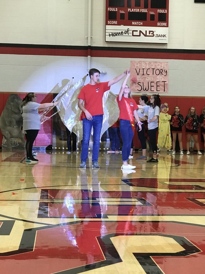 Avery Grumblet and Harrison Peacock enter the Pep Rally with style.