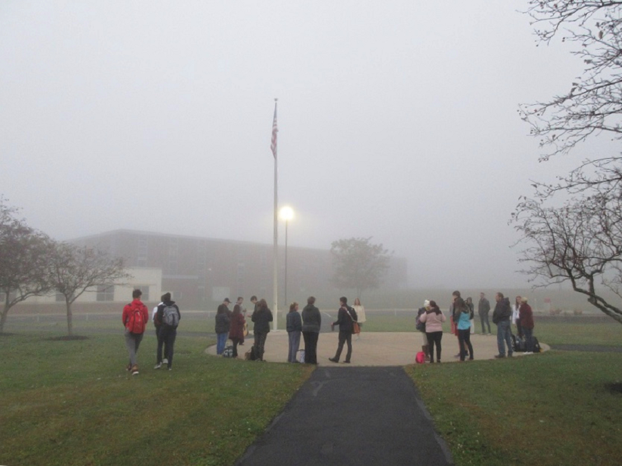 Students gather around the pole Wednesday morning to pray, worship, and enjoy time of fellowship
