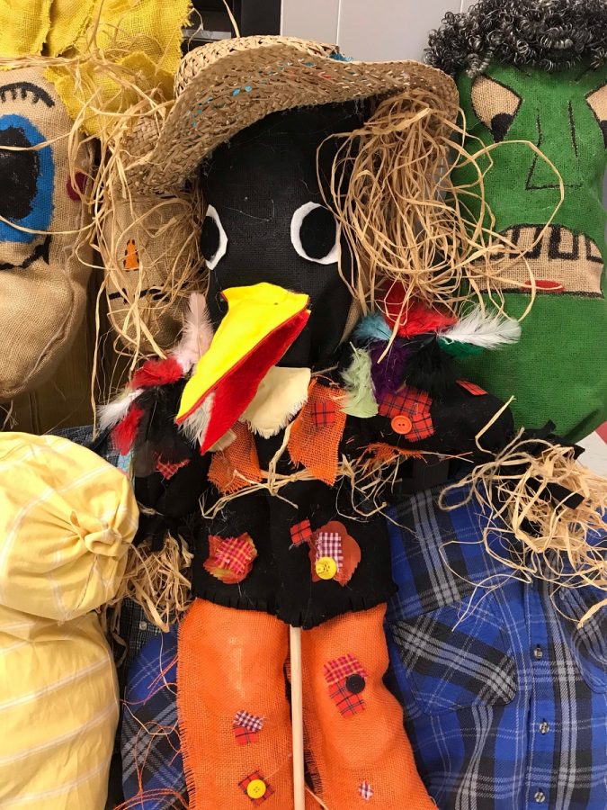 One of the many, unique scarecrows made by the Basic Art and Craft Classes.