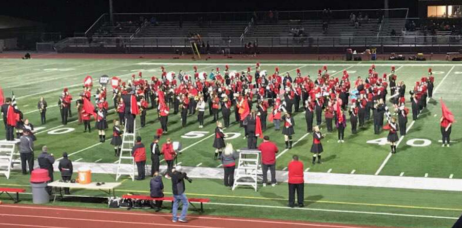 The Jr. High band joined the High School Bison Marching Band on the field to play their tunes together
