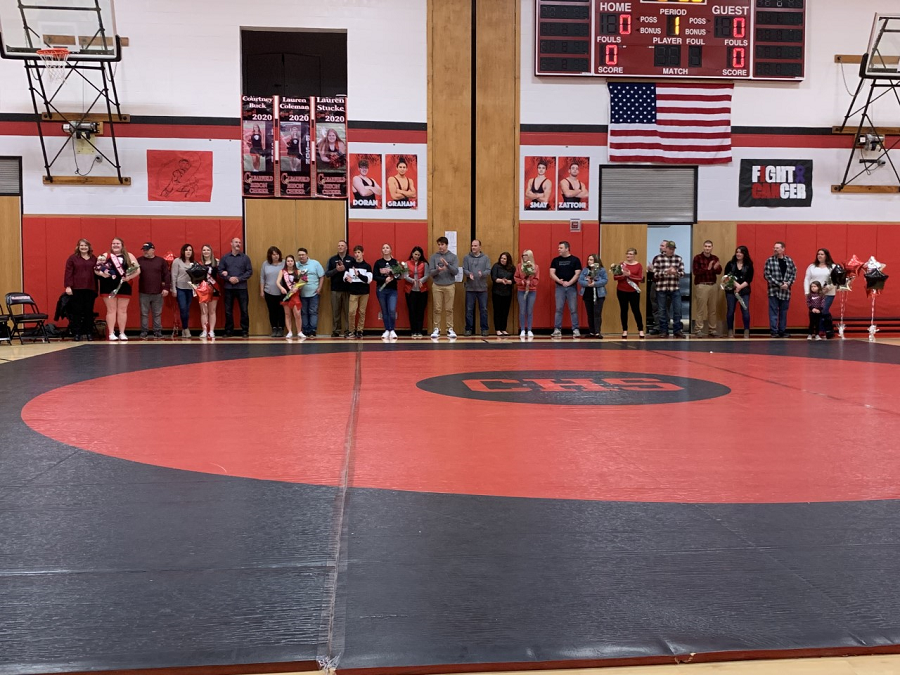 Everyone lined up along the back of the mat for one final photo. The wrestlers are not in this, as they had to go warm up. 