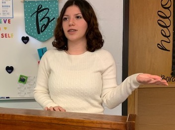 Alexia Mick presenting a speech in the Public Speaking course.