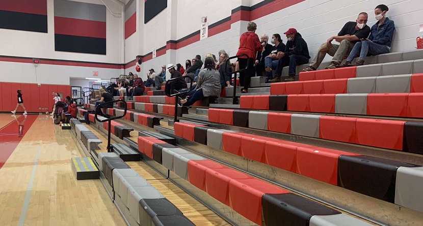 Spectators+at+the+girls+volleyball+game.