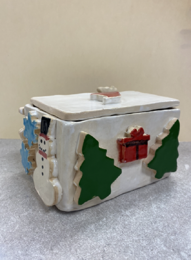 Pictured is a Christmas themed personality box created by one of Mrs. Barnett's ceramic 1 students. 