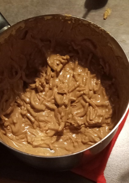 Chow Mein noodles in a pot full of melted goodness