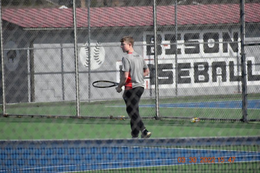 Ethan+Evilsizor+playing+tennis.+